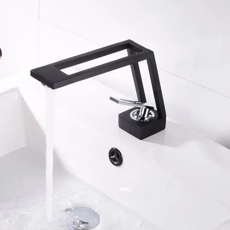 Modern minimalist matte black brass basin faucet with sleek rectangular spout and chrome lever handle decorbites black brass