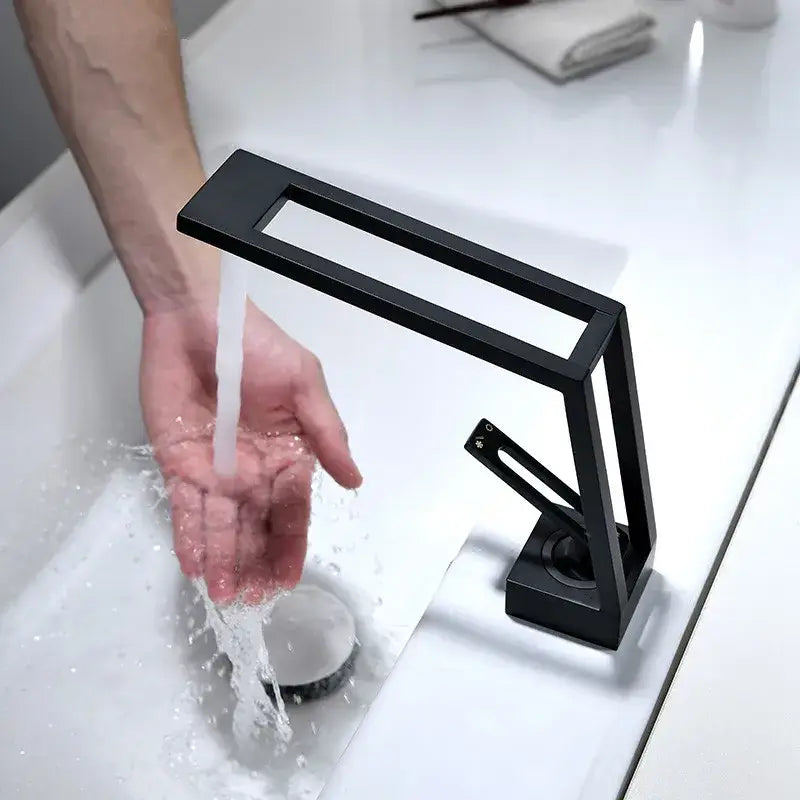 Modern minimalist black brass basin faucet with matte black finish and angular geometric design for bathroom use decorbites black brass basin faucet