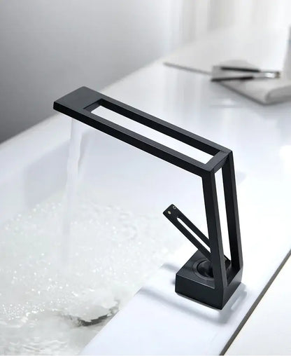 Modern minimalist matte black brass basin faucet with sleek angular design and waterfall spout by decorbites black brass basin faucet