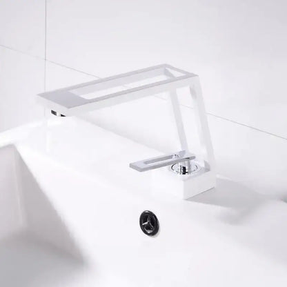 Modern white ceramic basin faucet with sleek chrome handle and spout in decorbites black brass basin design