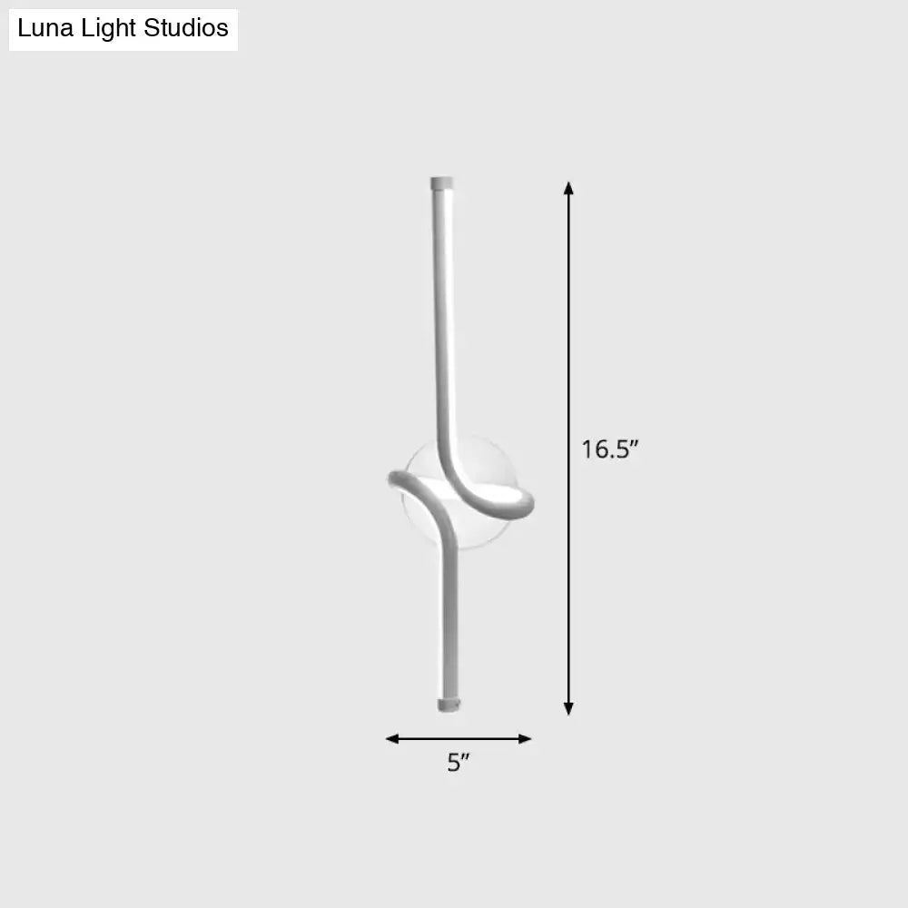 A sleek minimalist white led wall sconce with a curved metallic design and central circular glass element for bedroom use