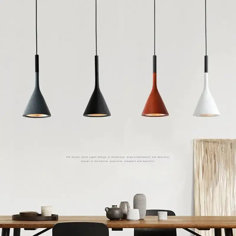 Four modern minimalist multicolor metal pendant lights with conical shades in matte black dark red and white for kitchen use