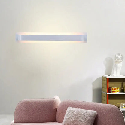 Modern minimalist silver linear wall lamp with a sleek white rectangular design for living room lighting