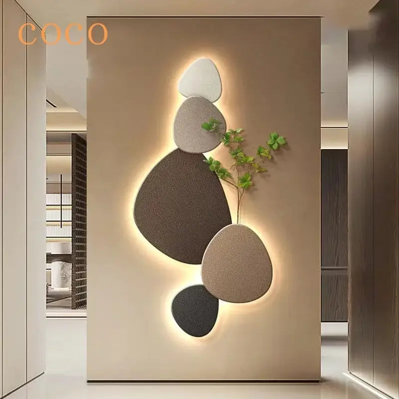 Modern minimalist wall lamp with five textured stone panels in white gray beige and black featuring decorbites green plant mural