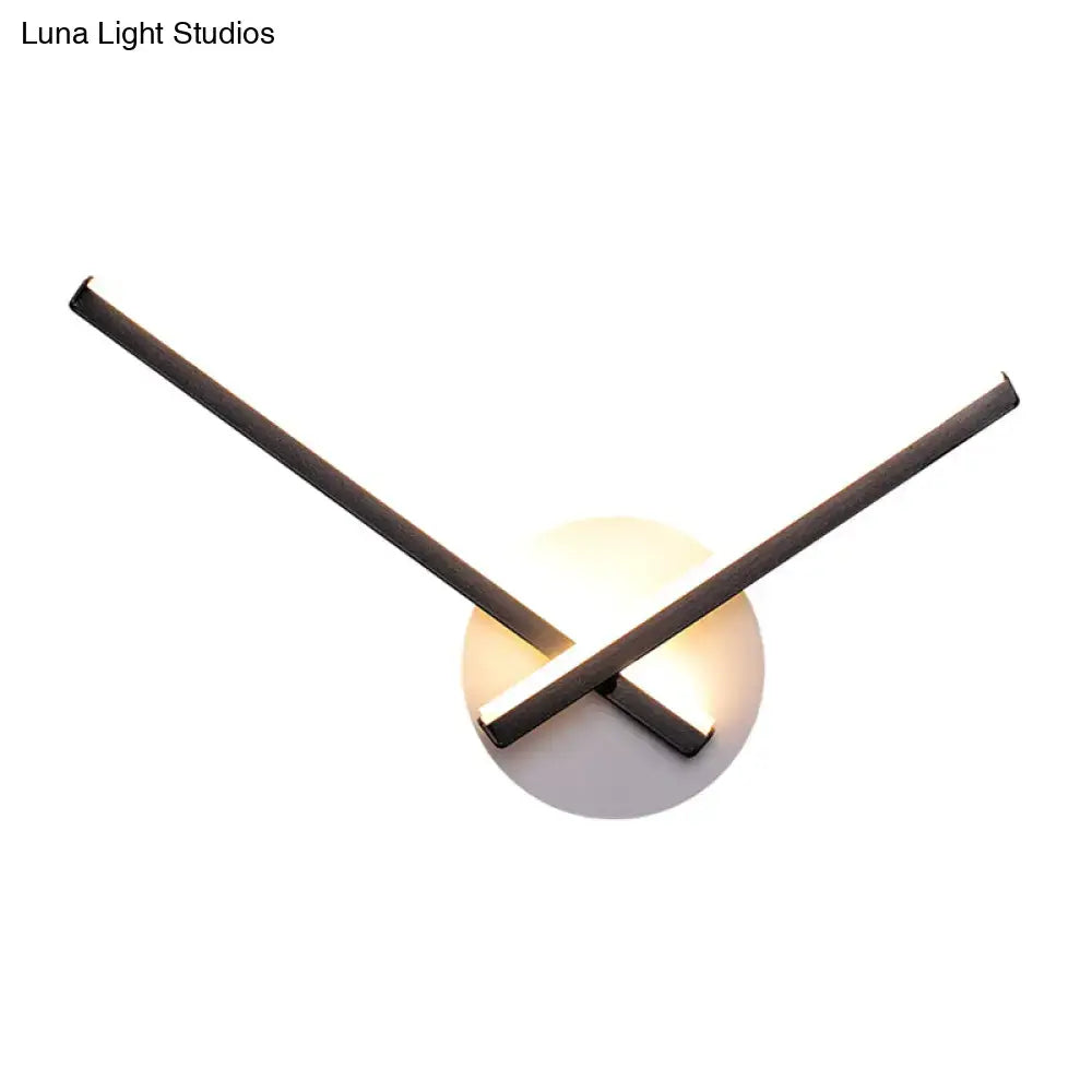 Modern minimalist white ceiling light with matte black metal arms and direct wired electric connection maximum bulb wattage noted