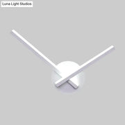 Modern minimalist white ceiling light with sleek arms and circular base featuring direct wired electric design