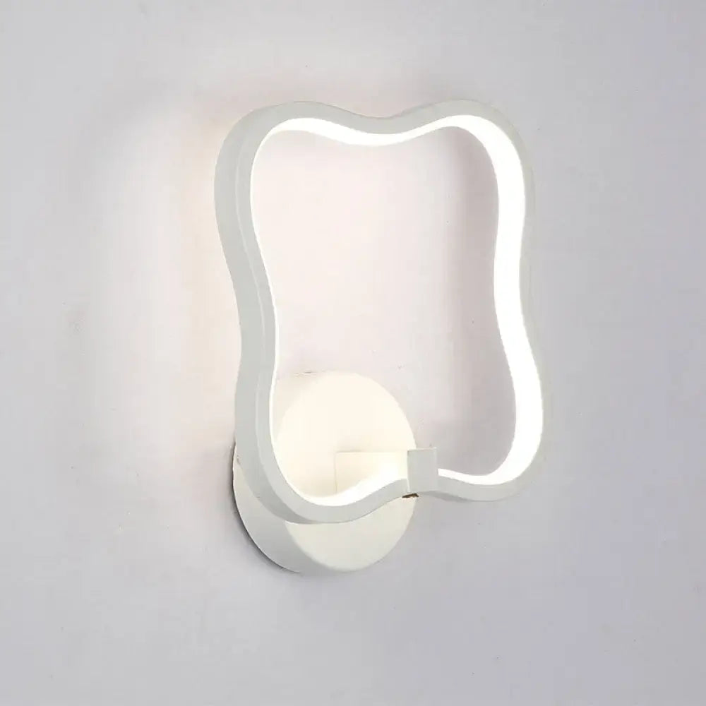 Modern minimalist white curved square led wall sconce with a wavy rectangular frame for bedroom lighting