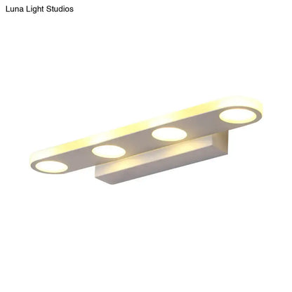 Modern minimalist white finish acrylic shade vanity light with three circular bulbs for maximum bulb wattage in bathroom