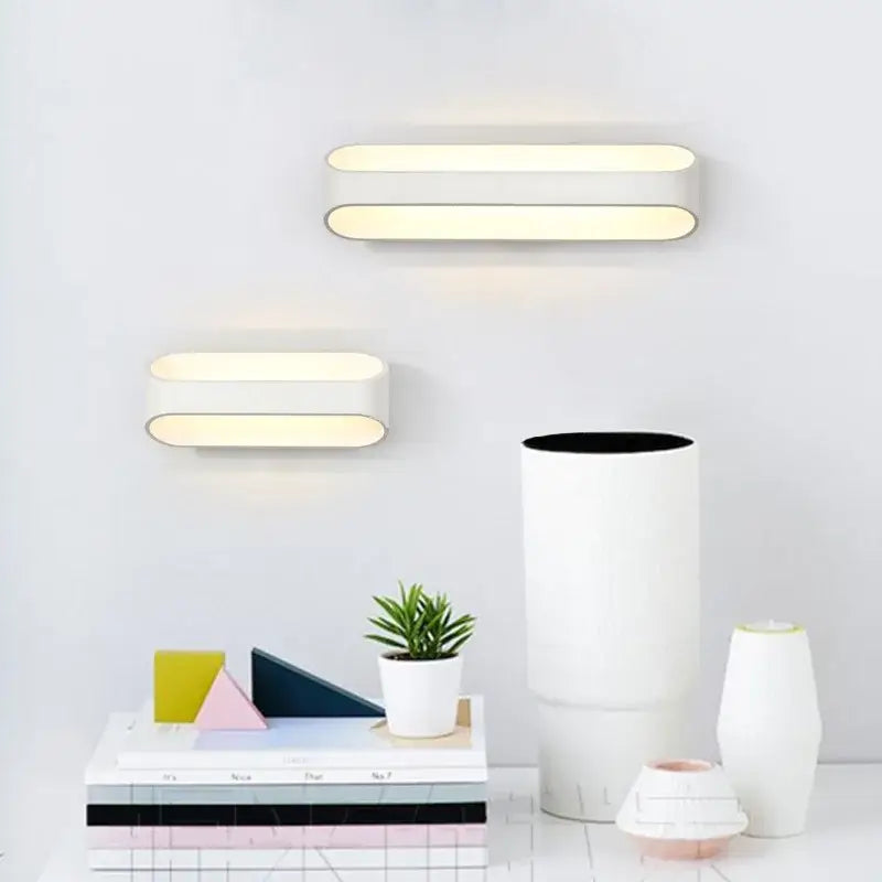 Modern minimalist white led wall lamps with sleek rectangular bodies providing warm diffused lighting for bedroom corridor lighting