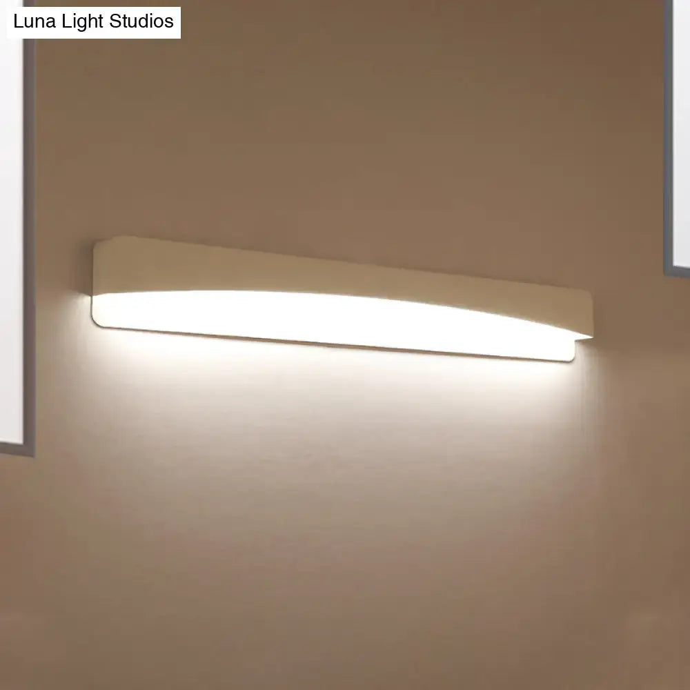 Modern minimalist off-white rectangular wall sconce lamp with sleek design and soft diffused lighting for bedroom use