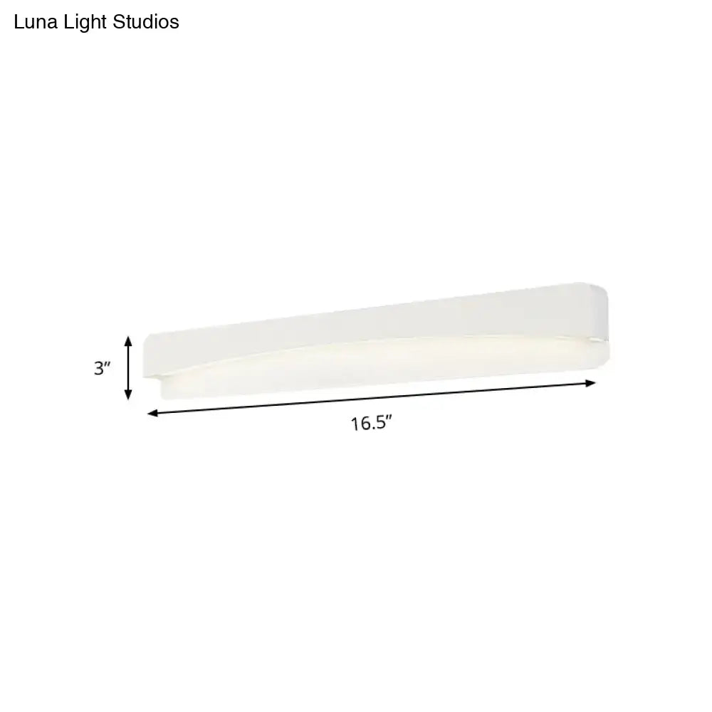 Modern minimalist white rectangular wall sconce lamp with frosted glass diffuser for bedroom lighting