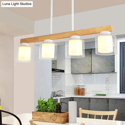 Modern farmhouse pendant light with natural wood beam and white glass shades for warm dining room illumination
