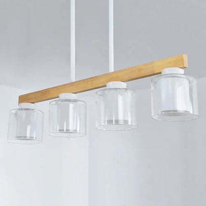 Modern minimalist wood pendant light with white glass shades featuring four heads for dining room illumination