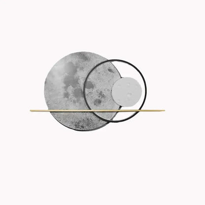 Modern moon deer wall light featuring abstract metallic moon phase decorbites deer wall light with textured gray surfaces and gold rod