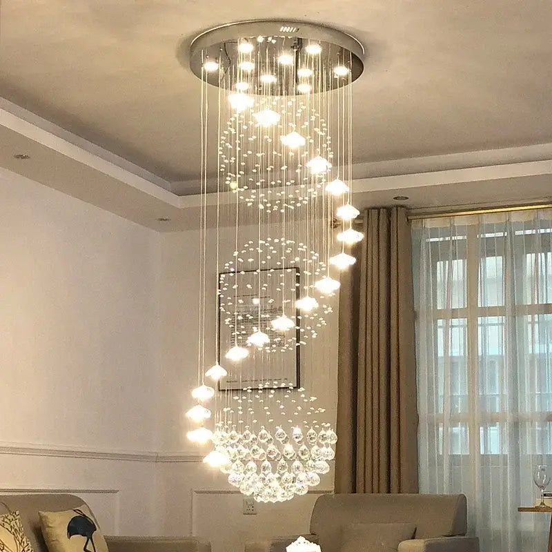 Modern multi tiered crystal hanging loft chandelier with clear faceted crystals and sleek chrome circular base by decorbites crystal hanging