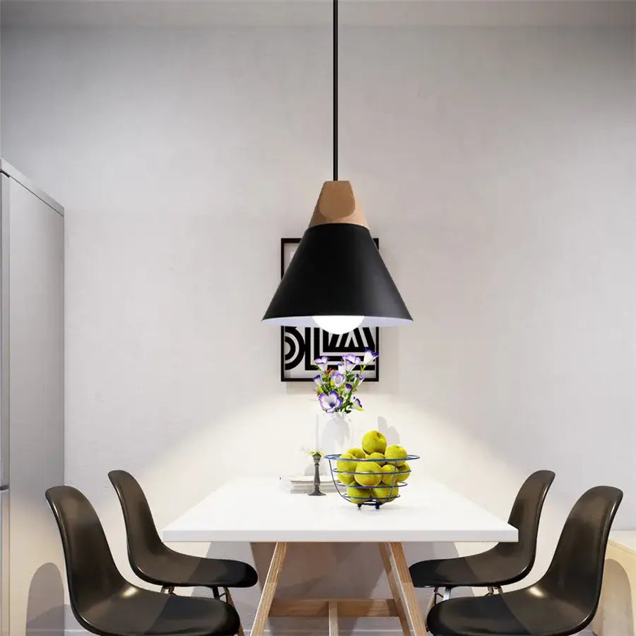 Black decorbites cone wood pendant light with wooden top accent hanging above white dining table
