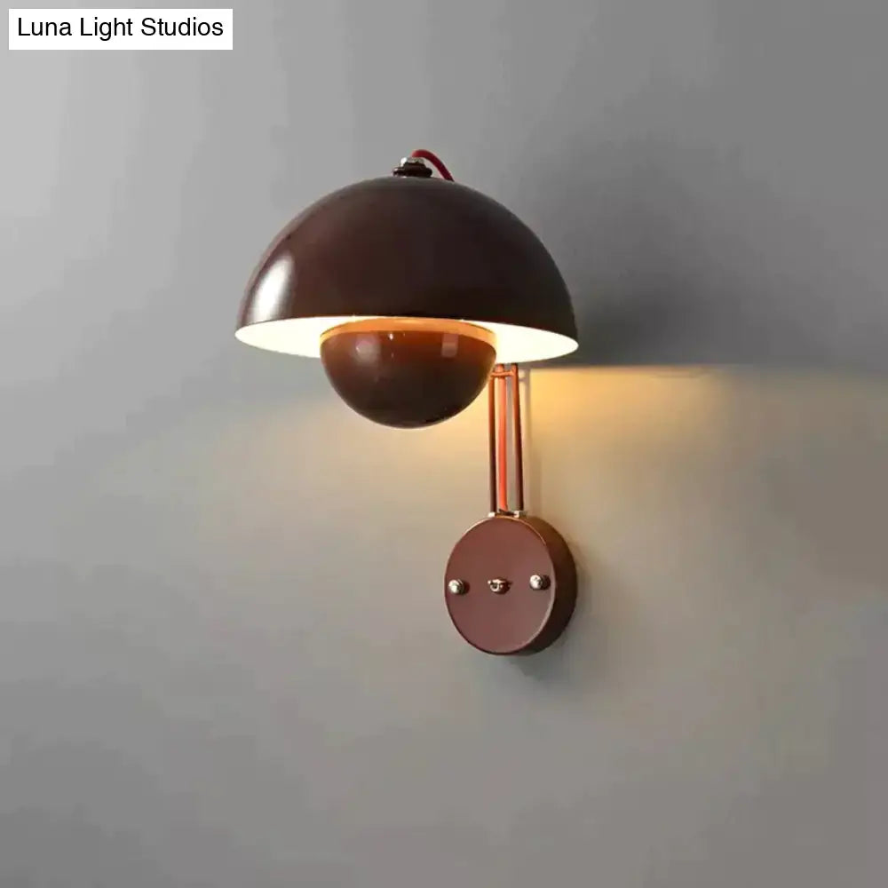 Brown metallic wall lamp with dome-shaped shade copper-toned accents and brass base type finish for modern bedroom