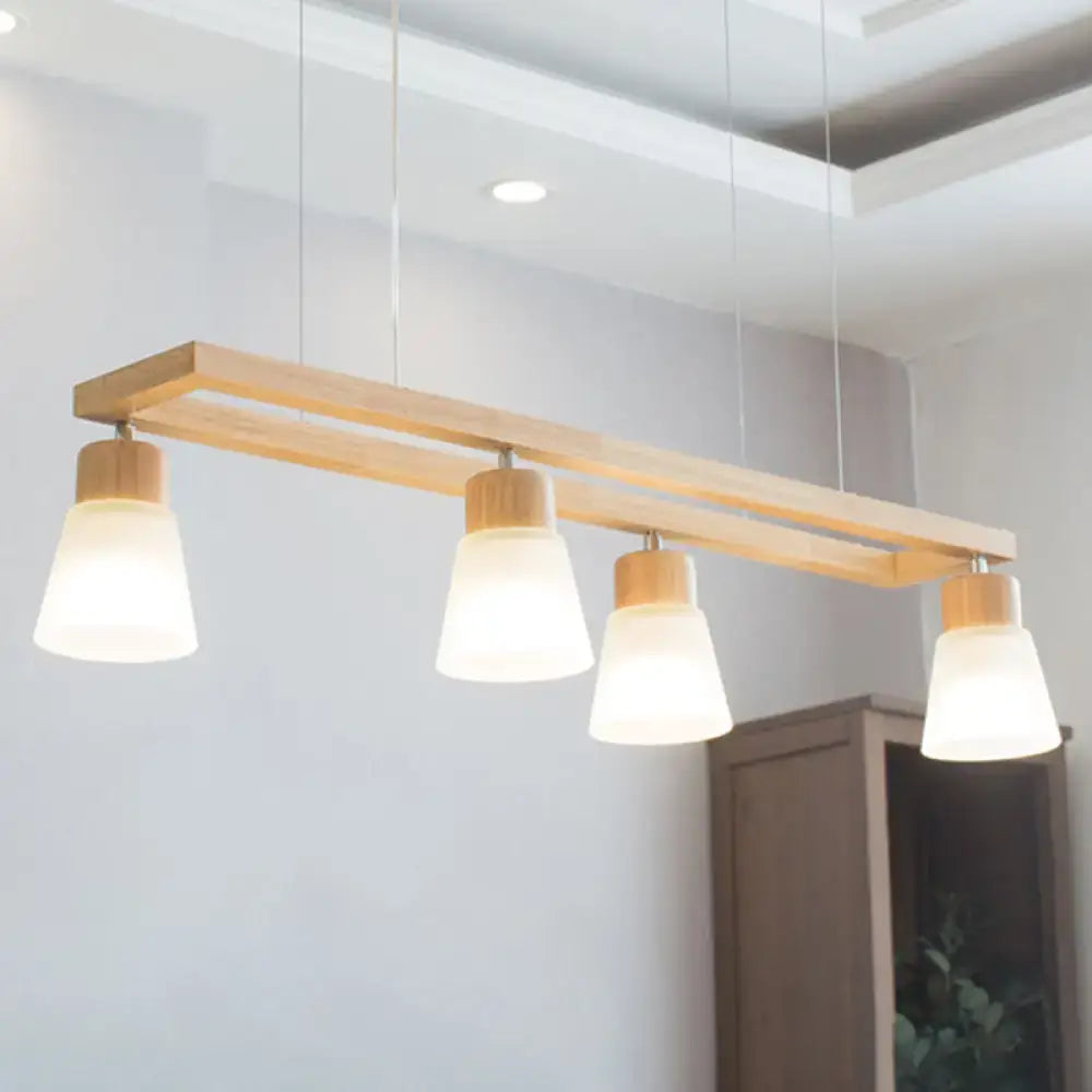 Modern natural wood rectangle island pendant light with four frosted glass shades and natural wood accents for pendant lighting