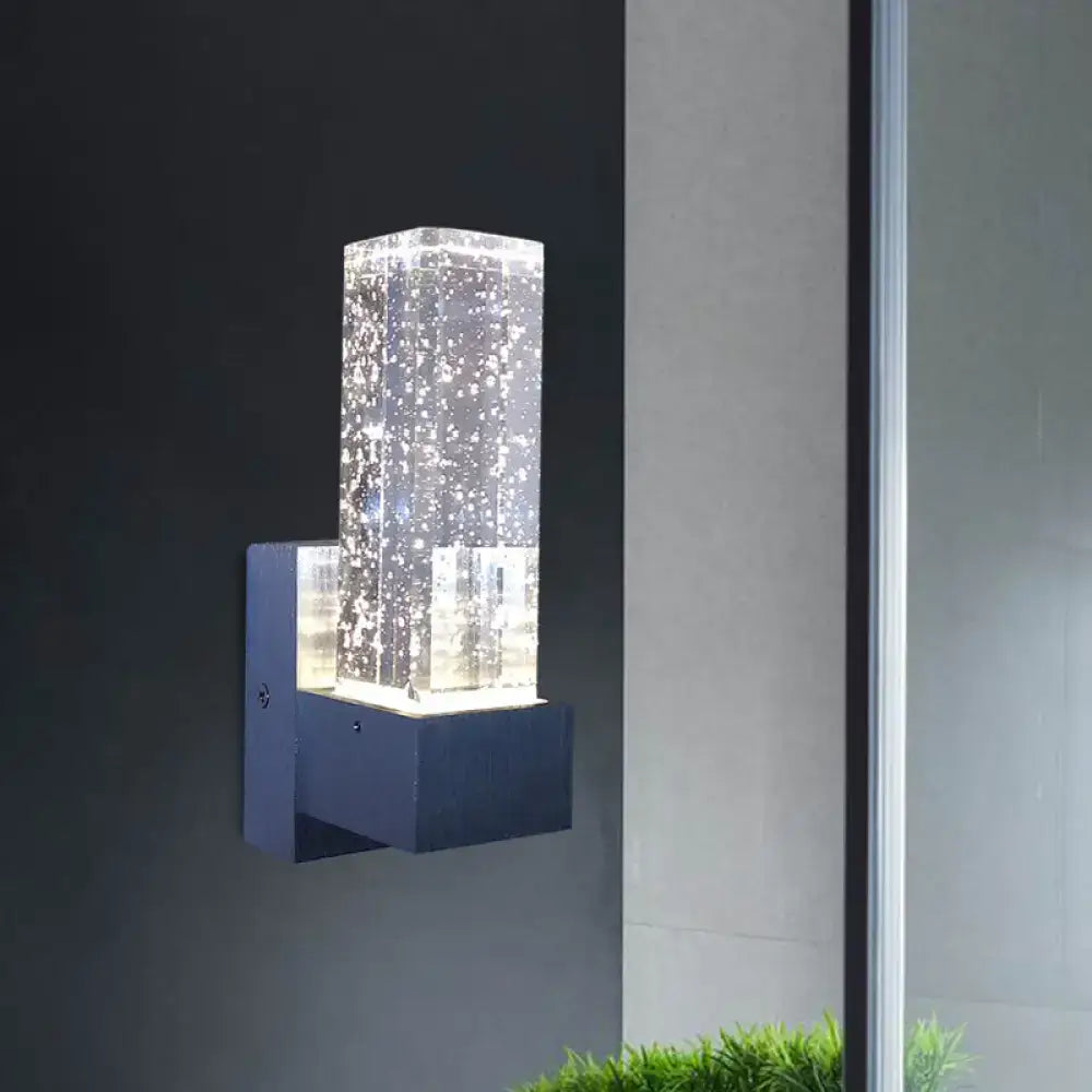 Modern navy and clear crystal bubble wall sconce with acrylic body and dark blue metal base wall lamp fixture width shown