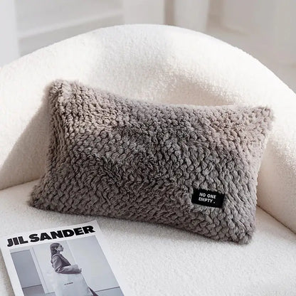 A cozy gray faux fur cushion cover with a black no one empty patch featuring decorbites geometric texture plush design