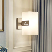 Modern nickel cuboid wall mounted sconce with frosted glass shade and brushed nickel finish for corridors