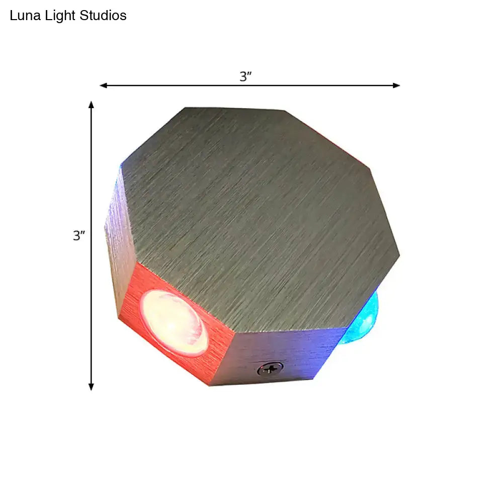 Modern octagonal wall sconce with nickel finish built-in led light and red and blue colored accent panels