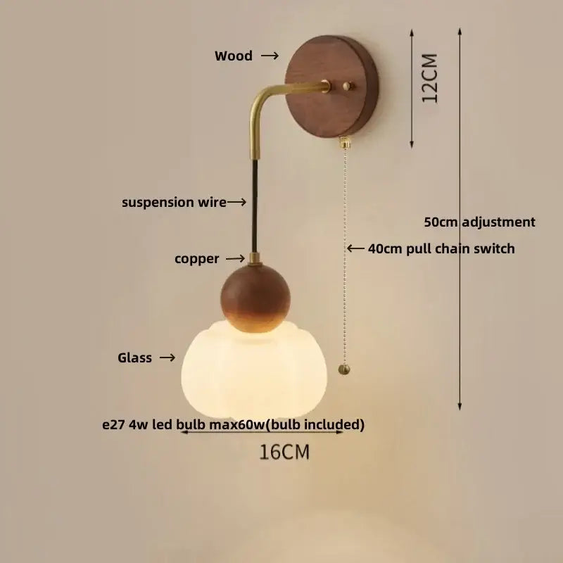 Modern nordic copper adjustable led wall light with warm-toned glass globe, wooden base, and copper accents for bedroom decorbites wall light