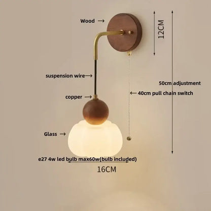 Modern nordic copper adjustable led wall light with warm-toned glass globe, wooden base, and copper accents for bedroom decorbites wall light