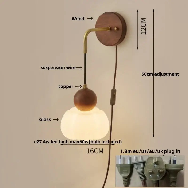 Modern nordic copper adjustable led wall light with a warm-toned wooden base brass accents and glass globe shade decorbites copper adjustable wall light
