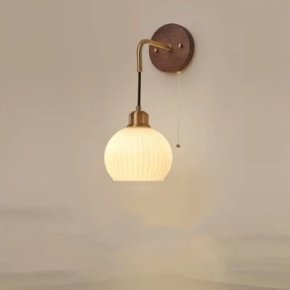 Modern nordic copper adjustable led wall light with warm-toned ribbed glass globe and brass arm for bedroom decorbites copper adjustable