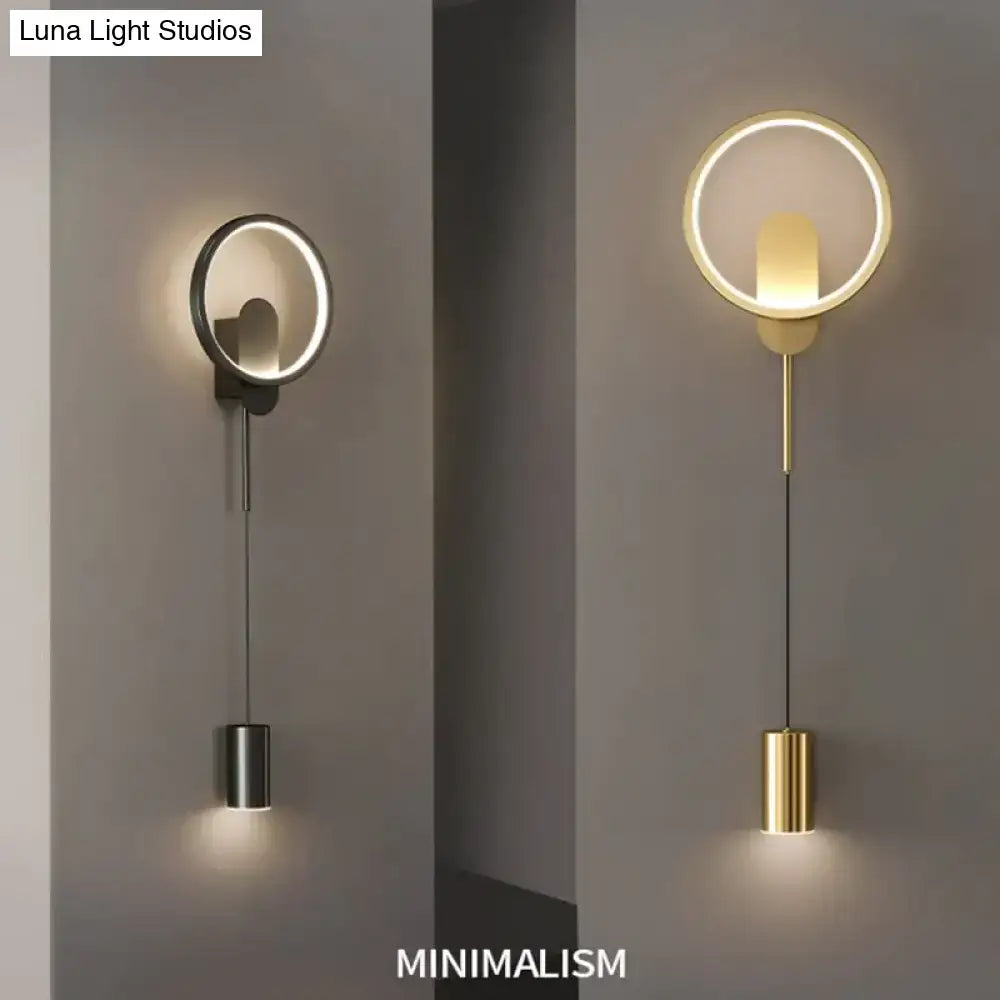 Modern nordic led black gold wall lamp with sleek metallic ring and cylindrical pendant in brushed steel or gold finish