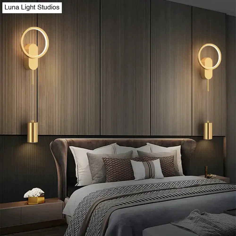 Modern nordic led black gold wall lamp with gold-toned circular sconces and cylindrical pendant lights for bedroom use