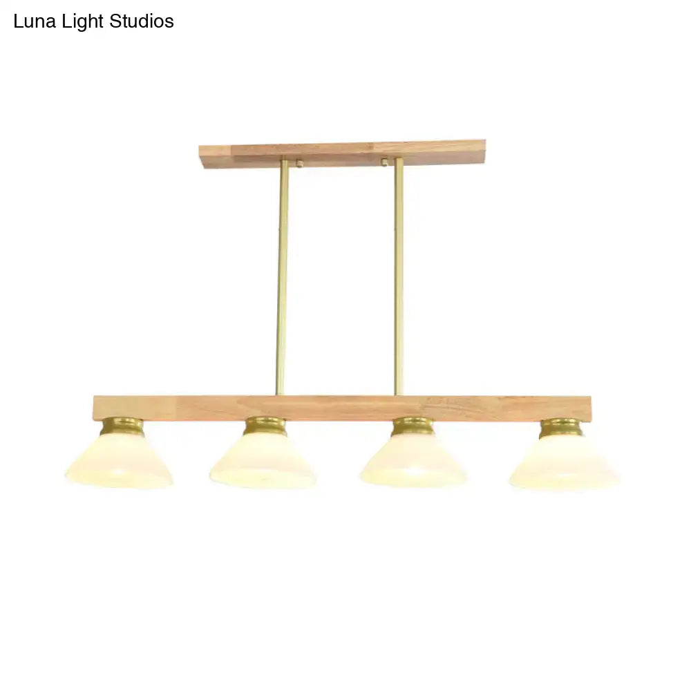 Modern minimalist nordic linear wood hanging light with natural wood frame brass accents and four opal glass shades