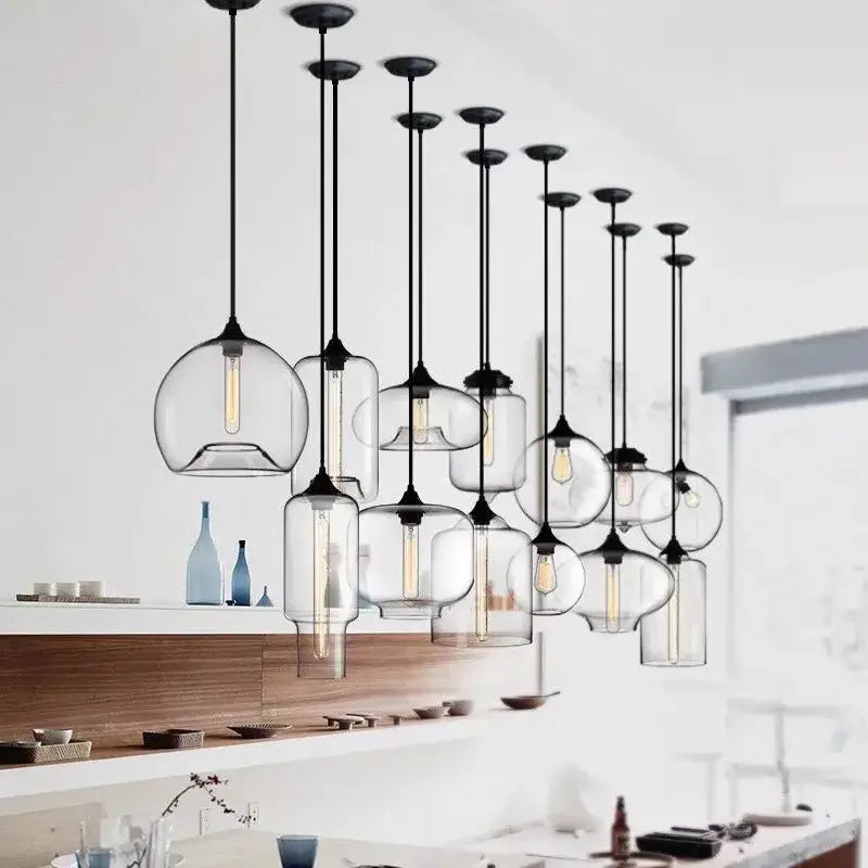 Modern nordic pendant light with polished chrome black metal fixtures and led filament bulbs for kitchen lighting