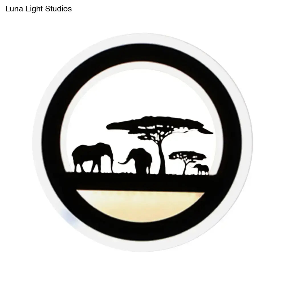 Modern nordic wall light with shelf features a circular led bulb included and black elephant silhouette design