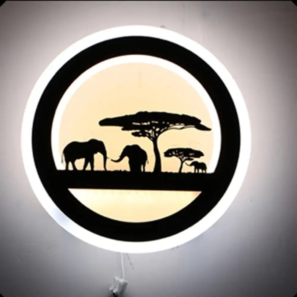 Modern nordic wall light with shelf featuring black elephant silhouettes and acacia trees with warm beige bulb included backlight