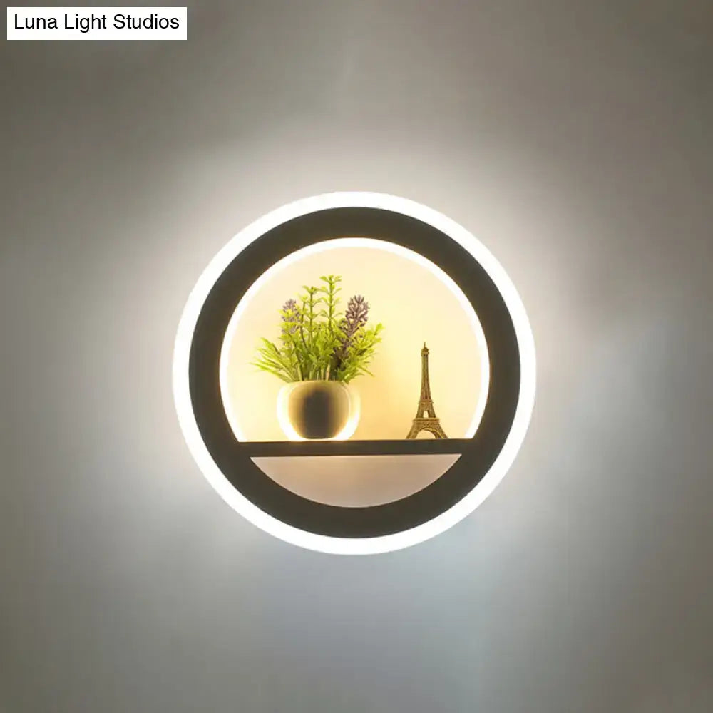 Modern nordic wall light with black frame and bright white led bulb included featuring illuminated shelf with decor items