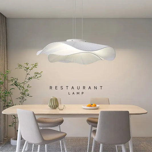 Modern nordic white fabric pendant light with cloud-like design and soft diffused glow for bedroom use