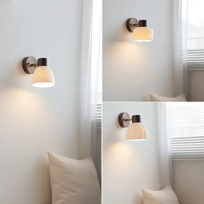 Modern nordic decorbites led wall light fixture with matte black metal base and off-white ribbed glass shade for bedroom
