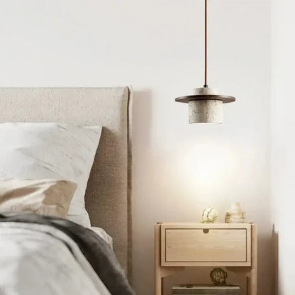 Modern off white stone and wood pendant light with textured concrete body and led bulb for softer decorative lighting