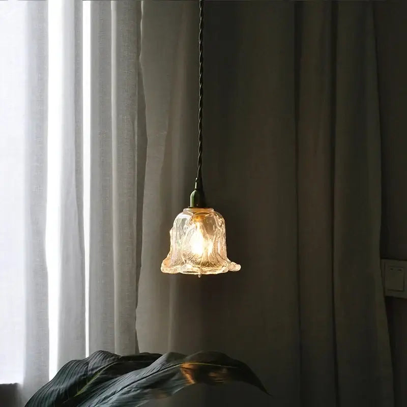 Modern olive green and copper glass led pendant lamp with warm amber textured bell shade and dark twisted cord decorbites copper glass