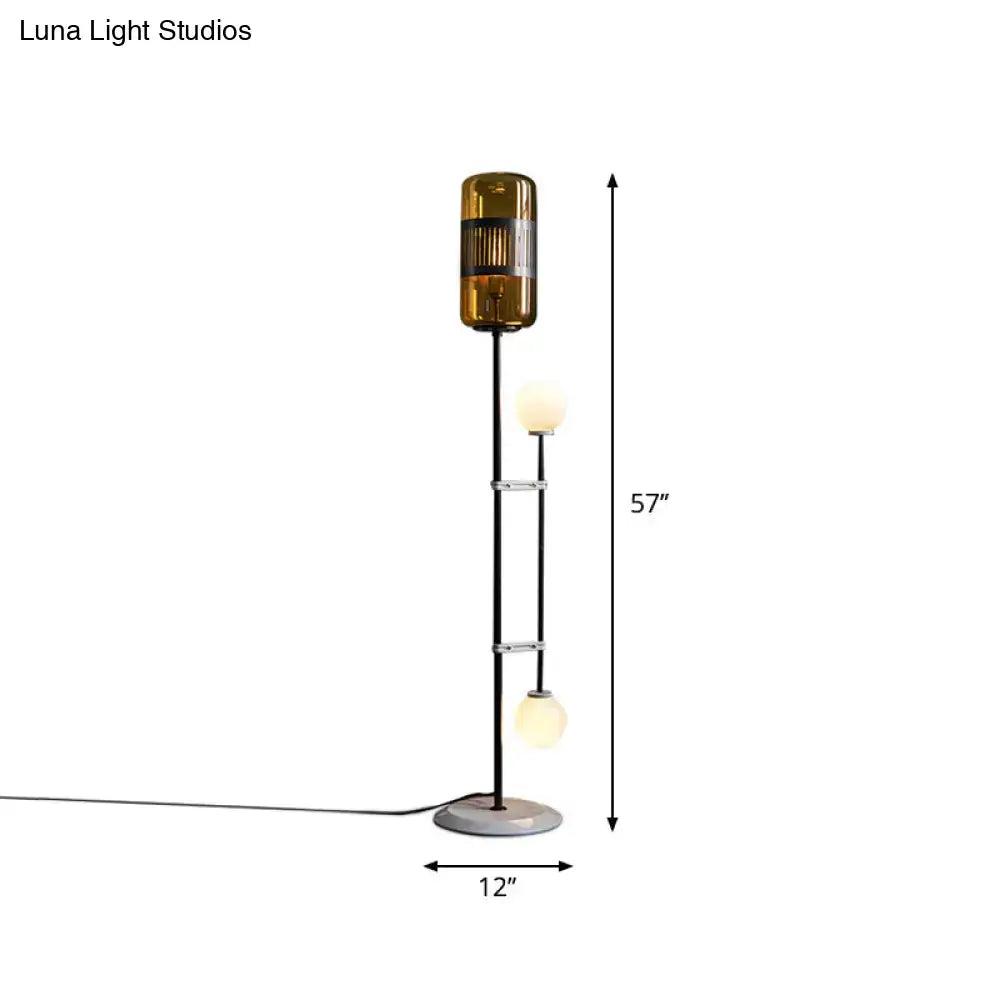Decorbites™ modern black metal floor lamp with amber glass shade and unique linear capsule arch design 110v-120v