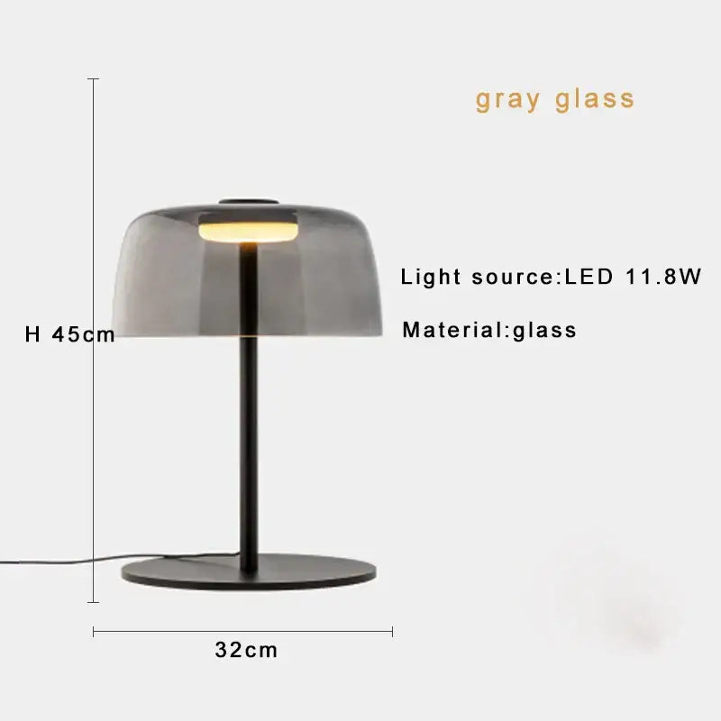 Modern orange glass table lamp with sleek translucent gray glass dome and black metal base for minimalist decorbites glass table use