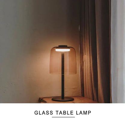 Modern orange glass table lamp with amber dome shade and matte black base for minimalist bedroom decorbites glass table lamp