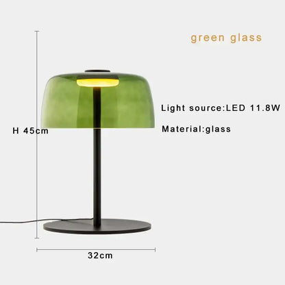Modern glass table lamp with translucent green dome and black metal base for minimalist bedroom decorbites lighting