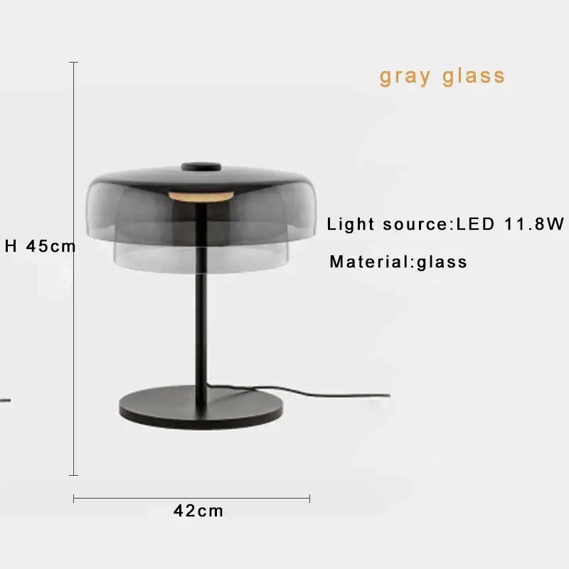 Modern glass table lamp with sleek translucent gray shade and black metal base for minimalist bedroom decorbites lighting