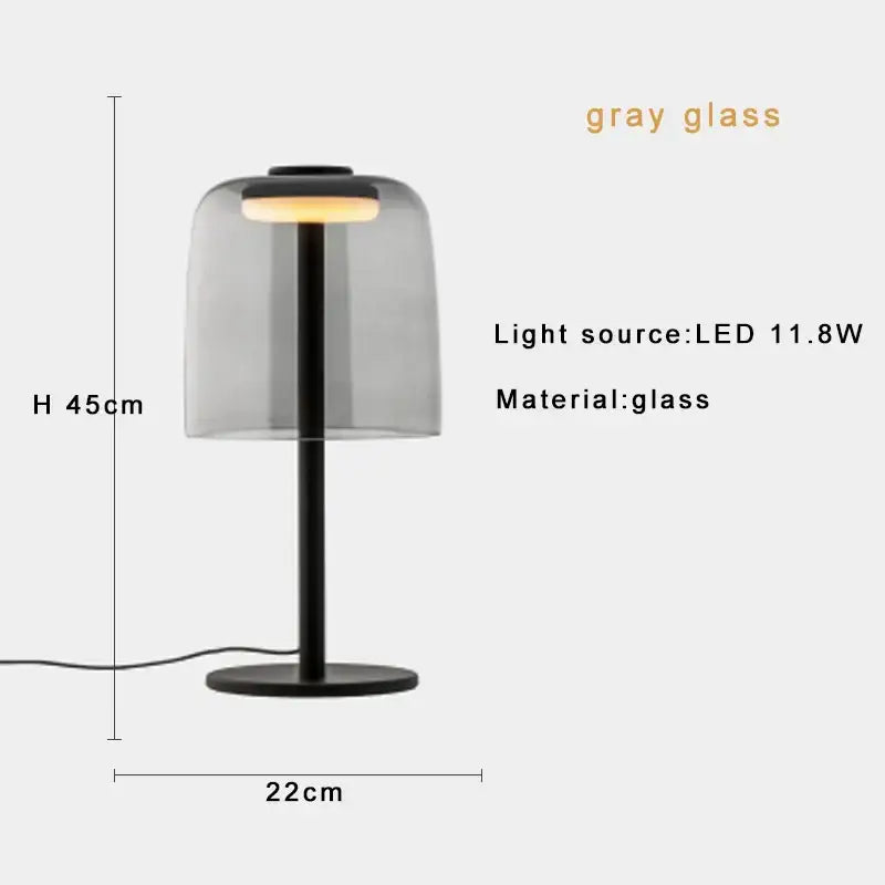Modern orange glass table lamp with a sleek black stand and translucent gray dome led light decorbites glass table lamp