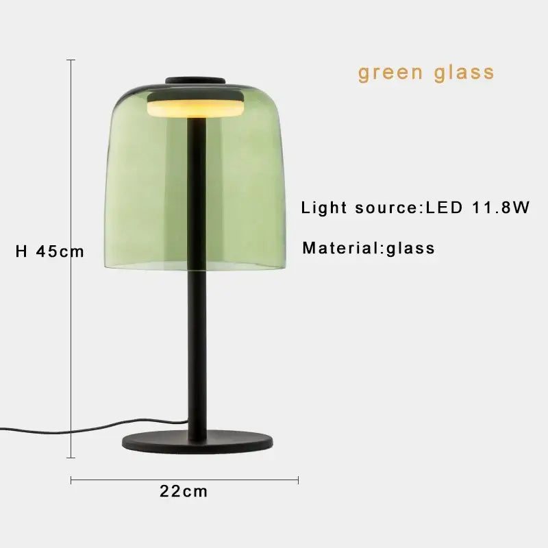 Modern orange glass table lamp with translucent green glass dome and black metal base for minimalist decorbites glass table lighting