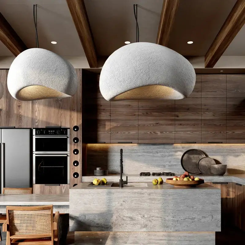 Two off-white textured dome pendant lamps hang from the ceiling in a modern organic handmade led chandelier decorbites design
