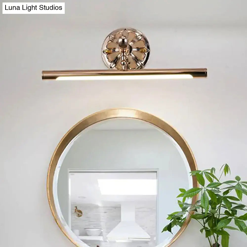 Modern ornate gold floral wall mount bathroom lamp with a gold-toned LED vanity light and sleek circular fixture design